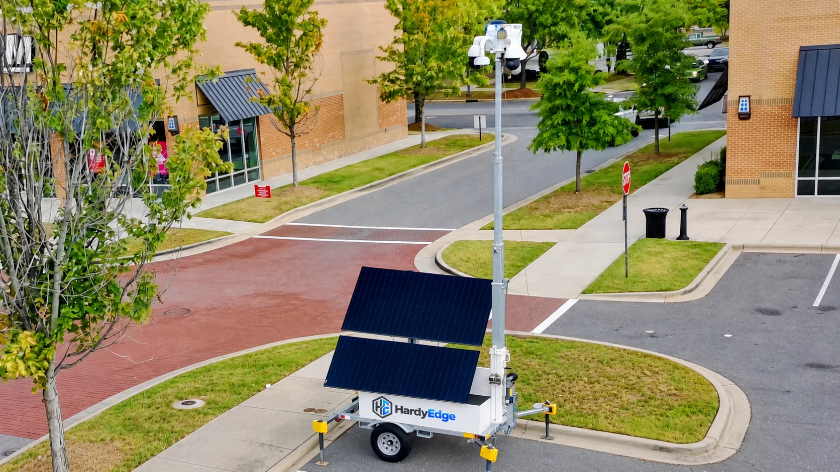 HardyEdge solar surveillance trailer at a parking area; approved concept visualization
